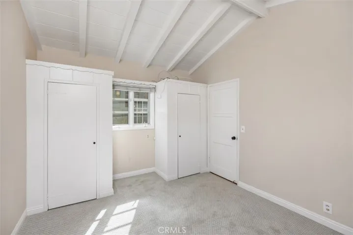 High ceilings in bedrooms not staged.