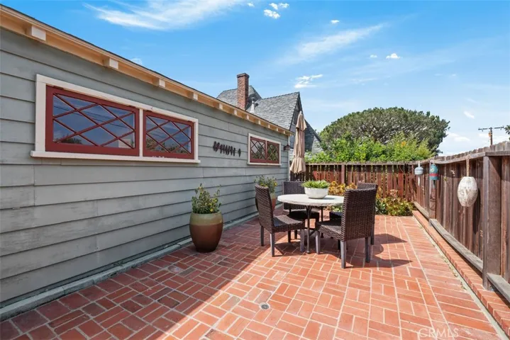Original windows and great patio space make this a charming entry.
