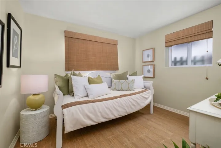 Downstairs bedroom or home office space sits on Lombardy lane side of home.