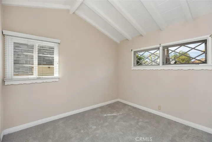 Second bedroom also has vaulted ceilings not staged.
