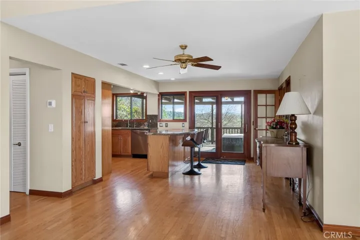 To the left is the hallway leading to the 2 upstairs bedrooms and 1 bathroom.