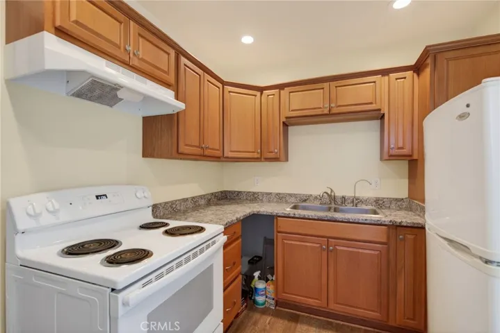 The kitchen has ample storage, and counter space.