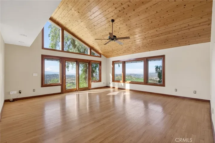 The vaulted ceiling, and high windows bring in plenty of light to the room.