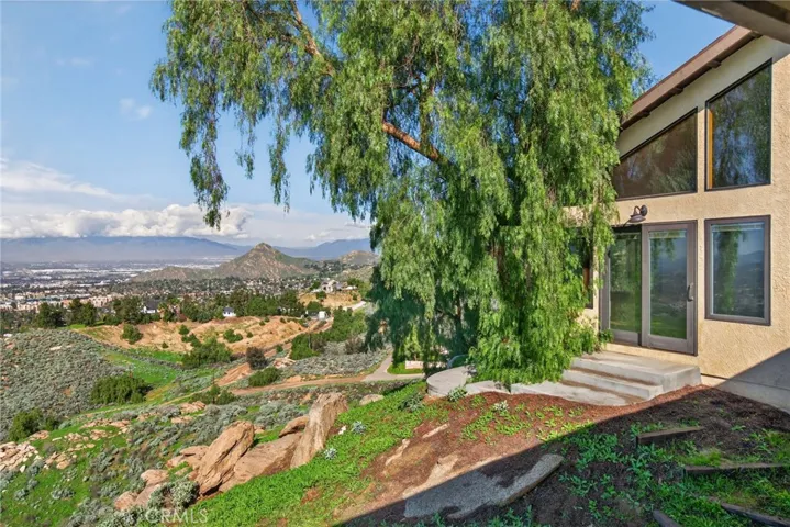 This angle shows the family room widows and patio.