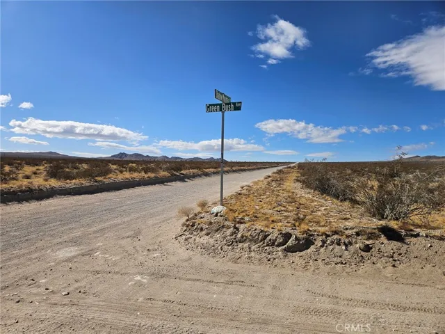 The intersection of Lessing Ave. (aka Green Bush Ave.) & Shadow Mtn. Rd. looking West.