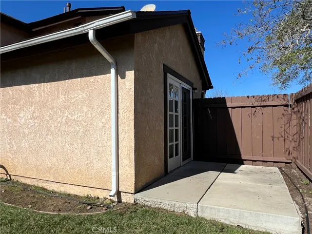 Separate entrance via slider to bedroom #2 using side gate on Vista Del Brisa Dr.  Great set up for separate tenants or possible home office entrance.
