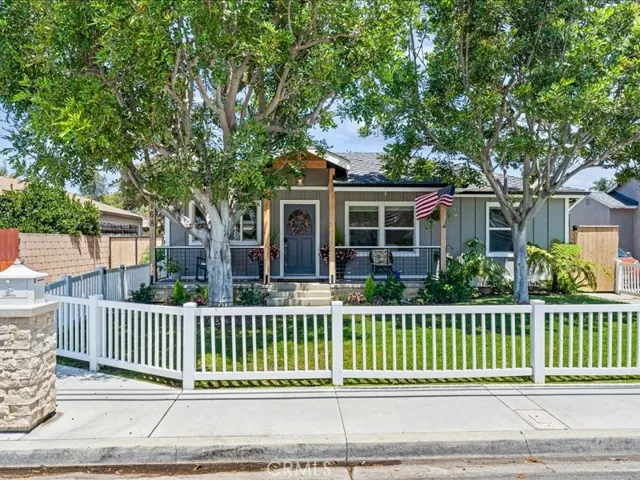 Welcome to 168 Monte Vista in East Costa Mesa,mature shade trees, lawn for kids play ,the family pets ,relax on your front porch and enjoy your favorite tunes with surround sound even on the front porch. Your white picket fence wraps it all up .