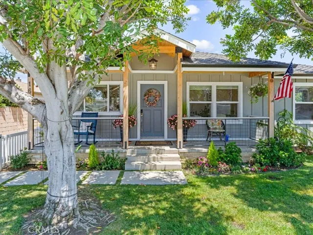 With its cottage like charm, short bike ride to the beach,plenty of driveway parking invite those friends over.