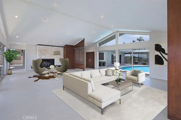 Living room overlooking courtyard and pool