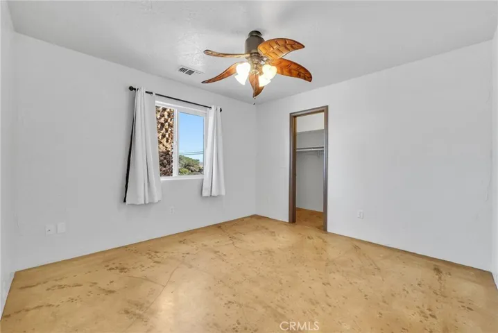 Guest Bedroom and Walk-In Closet