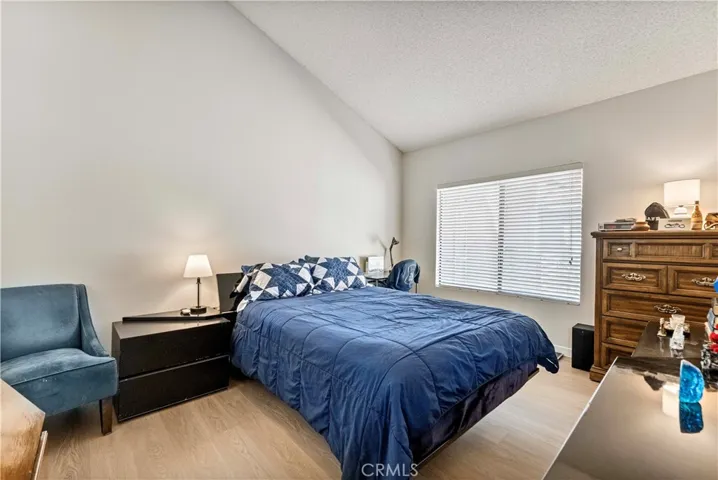 Large bright suite with vaulted ceilings and a large walk-in closet.