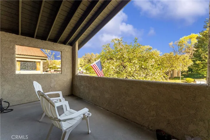 Large balcony with a view.