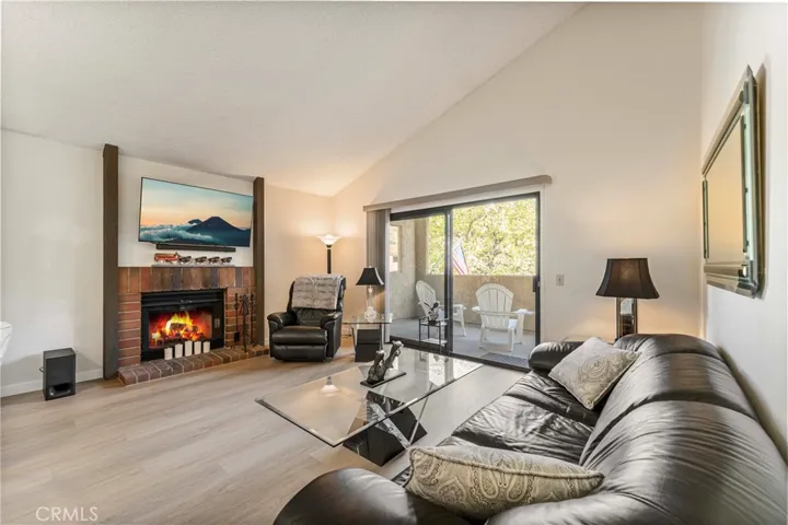 Sliding doors to the large patio deck with a view. You can also se your parking spot.