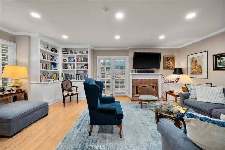 Living room with doors to access front patio.
