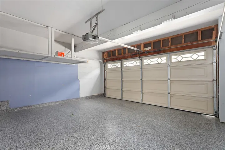 Attached 2-car garage with epoxy flooring
