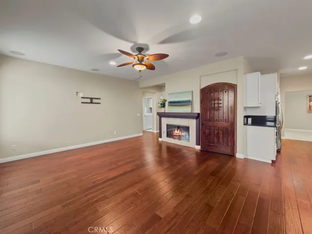 Family room fireplace and adjacent wine cellar closet