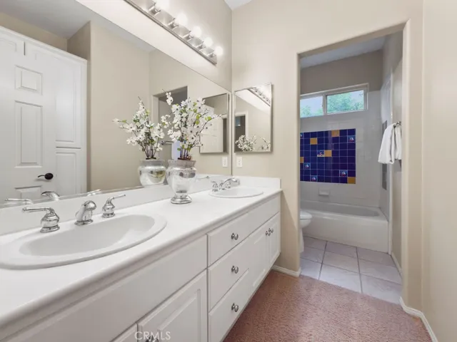 Dual vanity bathroom shared by 2 bedrooms