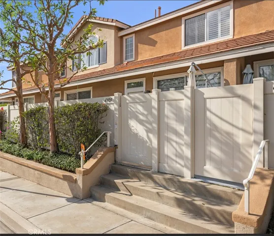 Privately gated courtyard entry