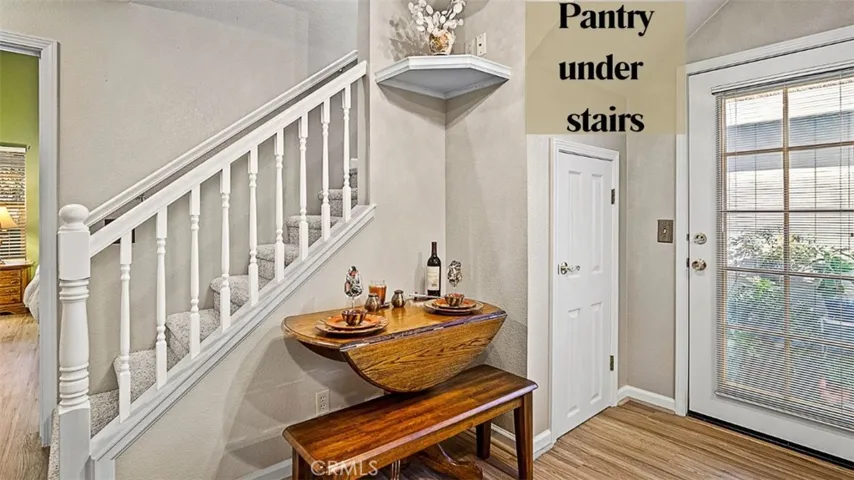L-Shaped Pantry under the stairs
