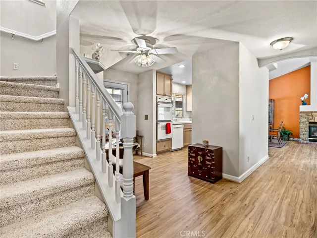 Looking from Den/3rd bedroom hallway toward kitchen and living room