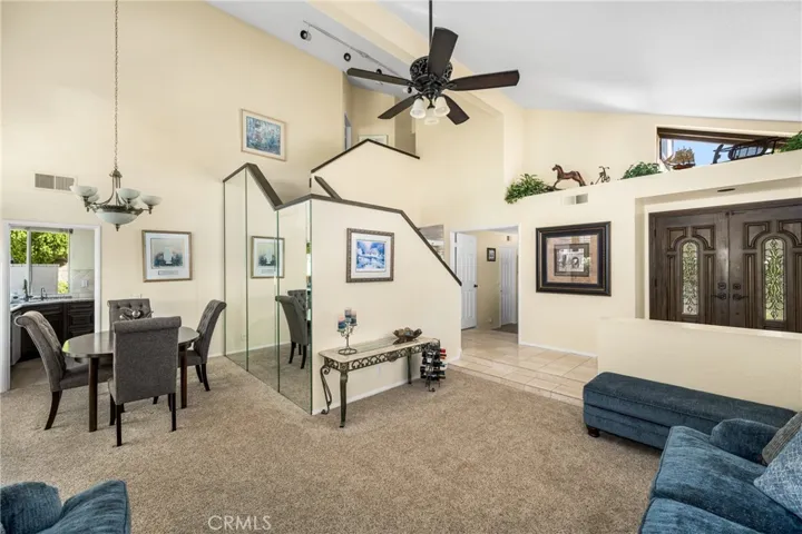 Another view of the living room and dining room