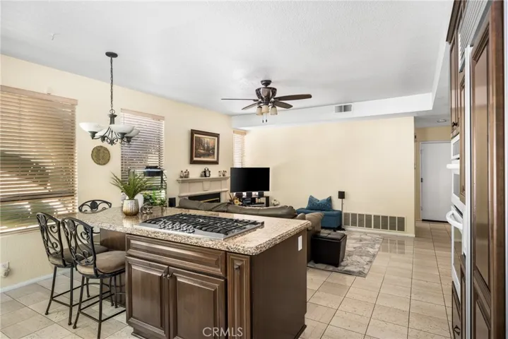 View of kitchen island toward the adjacent family room