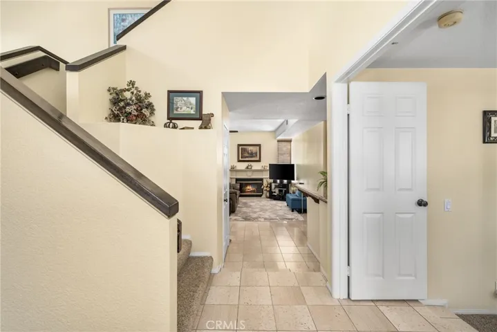 View of hallway to the stairs and family room