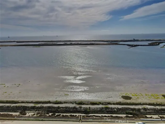 Walking trails with coastal wetlands and ocean views in Bolsa Chica