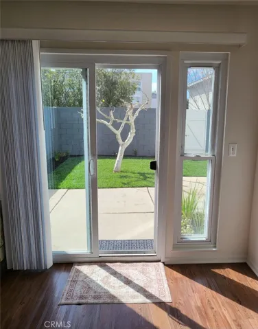 One of Two Sliding Glass Doors to the Back Yard Patios