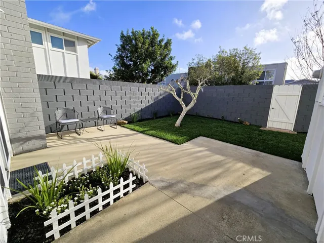 Back Yard Hardscape and Flower Garden Area
