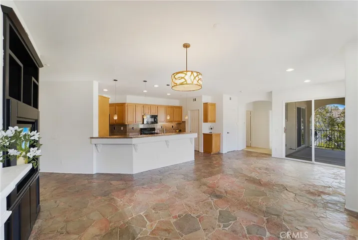 The dining area leads out to the balcony.