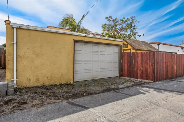 Garage with rear alley access.