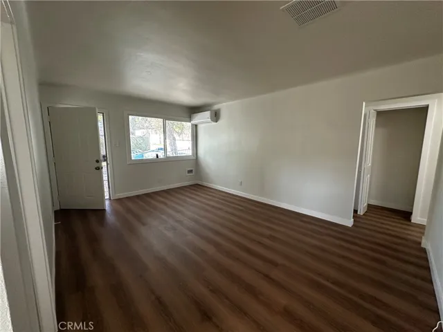 Living room; top floor from kitchen