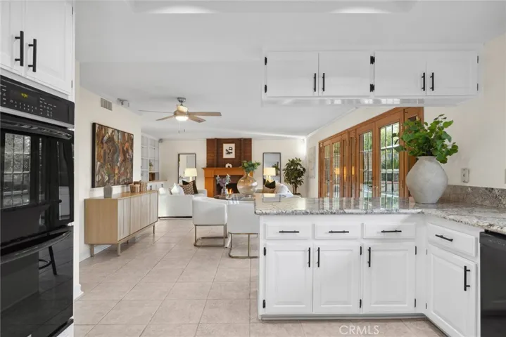 Make your way to the upgraded kitchen that includes granite counter tops and backsplash