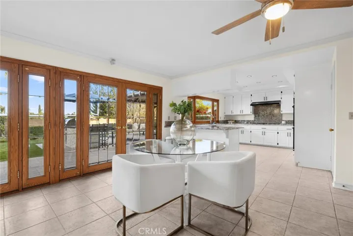 When you’re ready for some fresh air, step out of the triple pane French doors w/ beveled glass