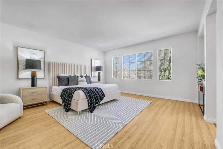 Spacious Primary Bedroom with areas for sitting and media niche