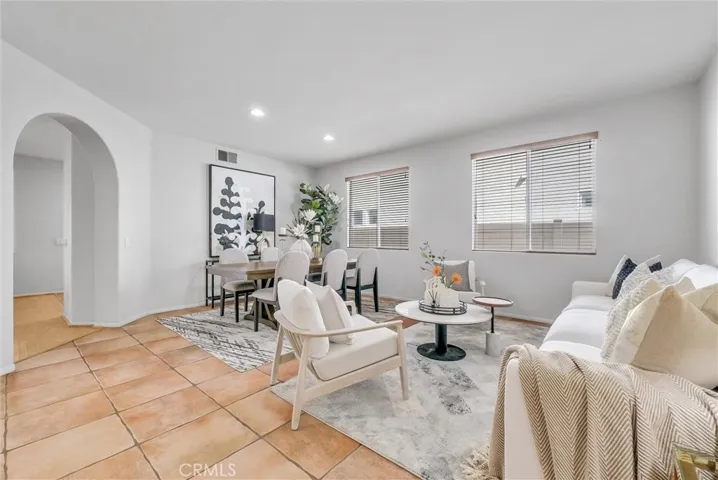 View of Living/Dining after passing the office and the powder room.
