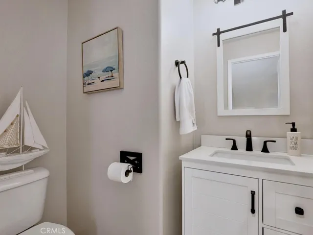 Main floor powder room with upgraded vanity