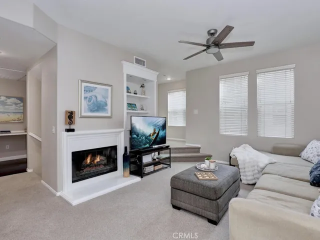 Living room features switch start gas fireplace