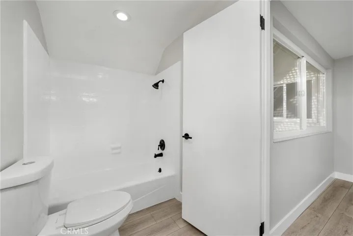 Resurfaced shower/tub and new toilets