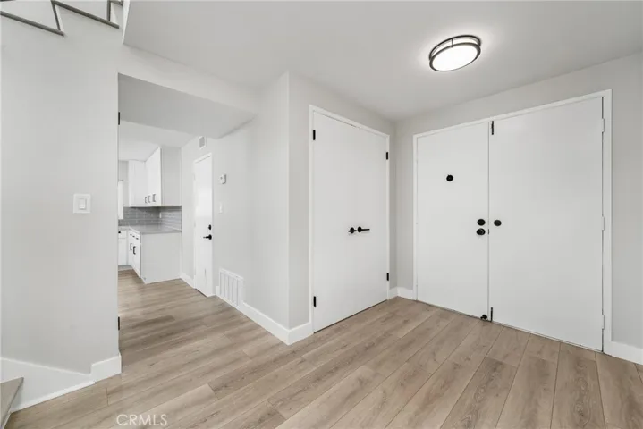 Entering the home through double doors.