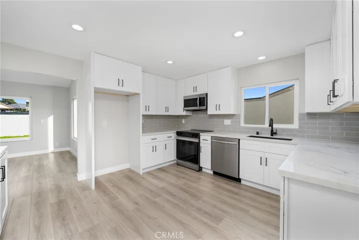 The efficient layout flows into a nicely appointed kitchen.