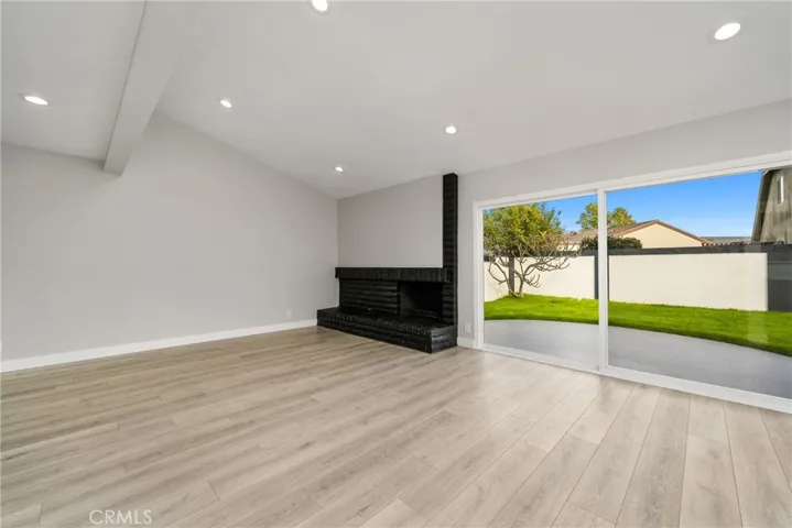 Spacious family room with plenty of lighting!