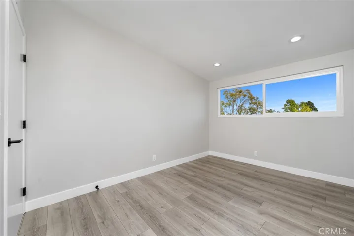 1 of 4 bedrooms before virtual staging.