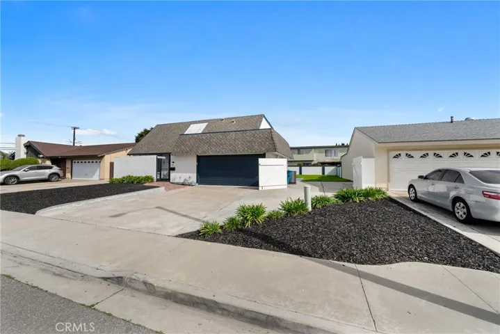 Double-wide gates open to the side yard with room to park an RV, boat and toys!