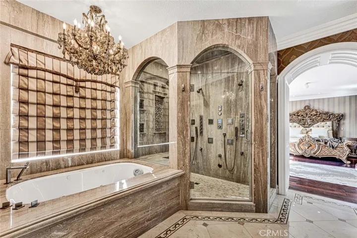 The soaking tub is long and deep for a satisfying soak, with the added comfort of spa jets. Get ready for the shower close-ups!