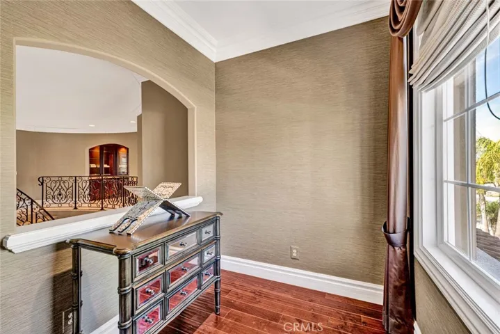The is the cubby for a computer desk/home office or reading room with a nice comfortable chair.