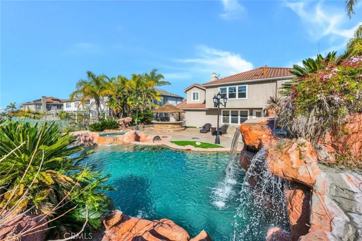This secluded corner of the pool has a second fire pit to sit and enjoy on a cool evening.