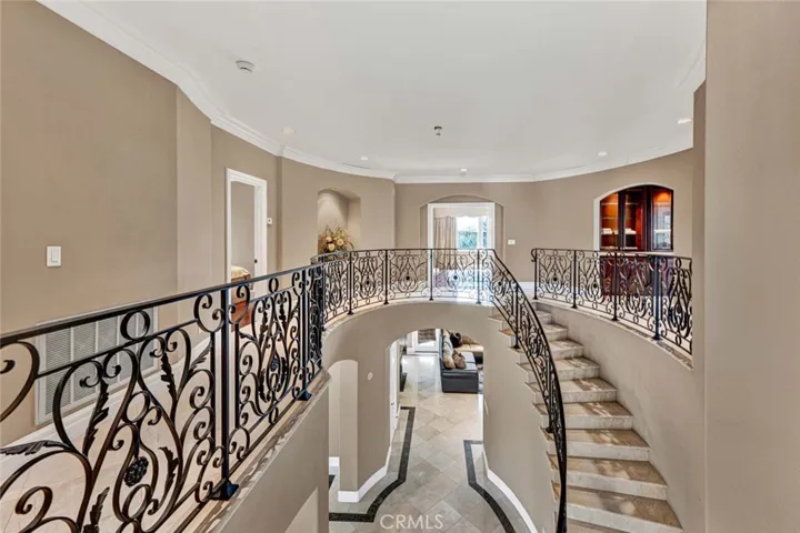A view of the open balcony encircling the upper level. The detail in the wrought iron work is just amazing.