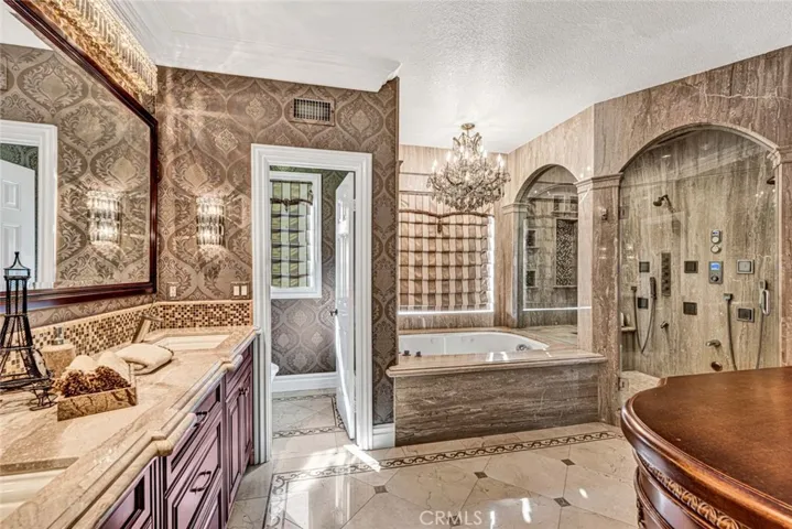 A view from the opposite direction showing the soaking tub and amazing shower.